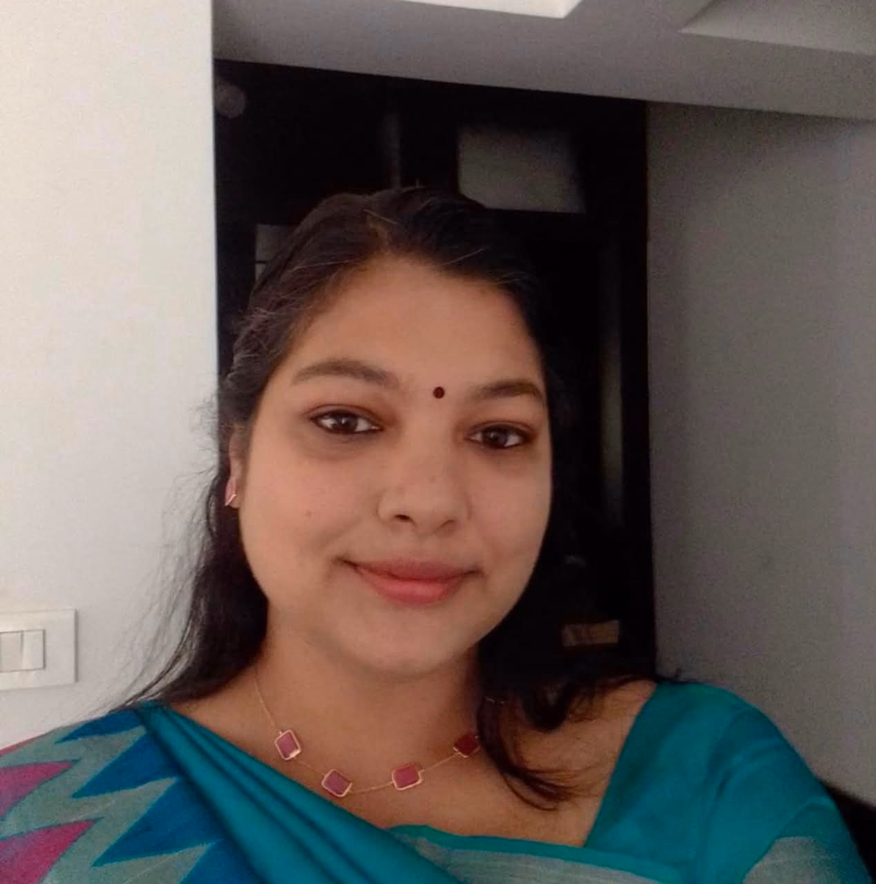 Dr Devika J
